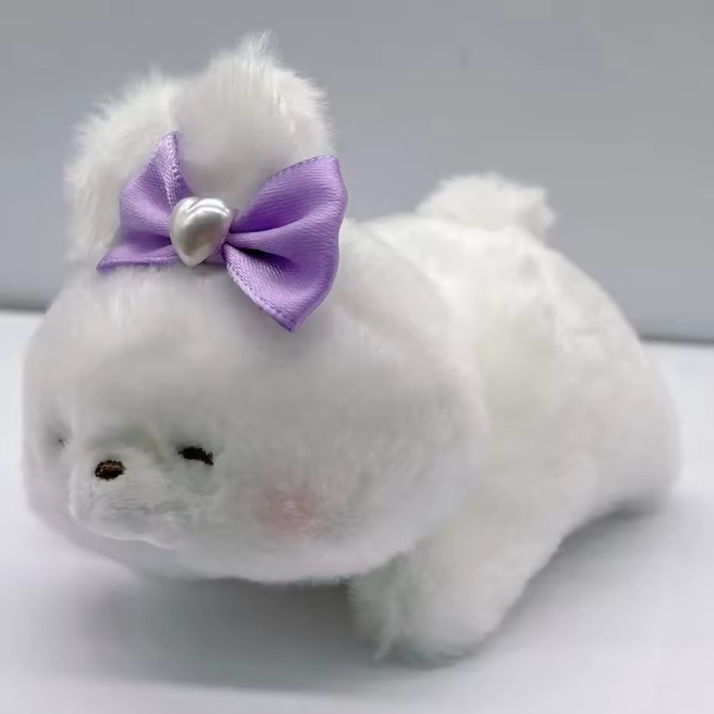 Plush White Seal with Purple Bow